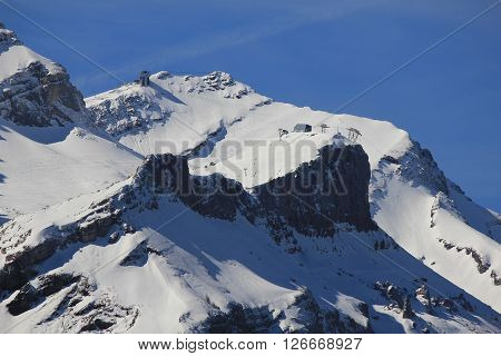 Cable car station Scex Rouge ski area. Ski area near Gstaad, Swiss Alps.