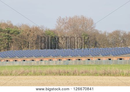 Modern barn with solar collectors on the roof