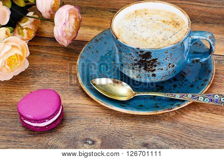 Sweet  French Macaroons with Cofee Cup. Studio Photo