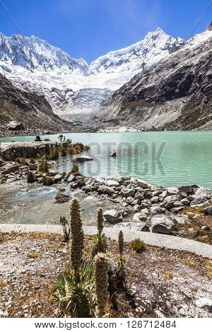 Llaca lagoon (4474 m) in the peruvian Andes and Ocshapalpa peak (5888 m) and Ranrapalca peak (6162 m) Peru