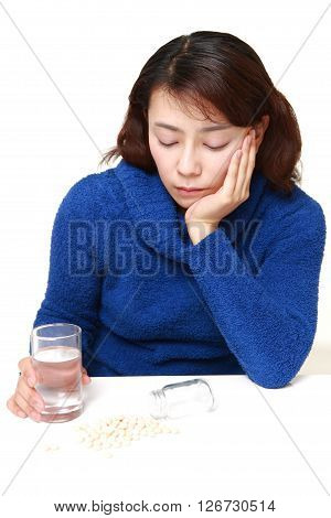 Asian woman suffers from melancholy on white background