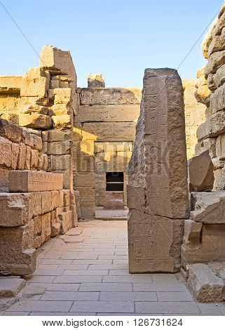 LUXOR EGYPT - OCTOBER 7 2014: The side chambers of Khonsu Temple with the remains of reliefs on the walls Karnak Complex on October 7 in Luxor.