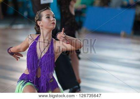 Minsk Belarus -April 3 2016: Unidentified Female Dance Performs Juvenile-2 Latin-American Program on IDSA Championship Kinezis Star Cup - 2016 in April 3 2016 in Minsk Republic of Belarus