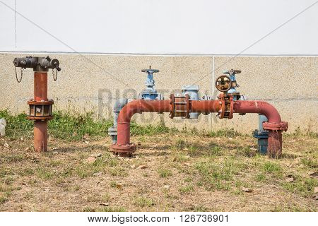 Rusting old big water valve at outdoor
