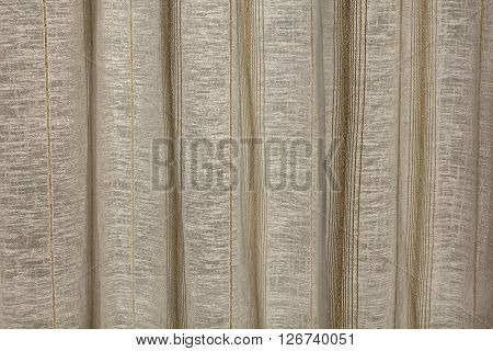 A background thread rolling curtain in horizontal composition.