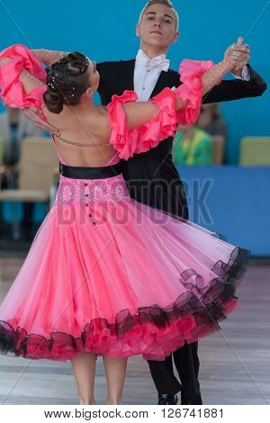 Minsk Belarus -April 3 2016: Dubovik Timofey and Zagrebailova Yana Perform Youth-2 Standard Program on the IDSA Championship Kinezis Star Cup in April 3 2016 in Minsk Republic of Belarus