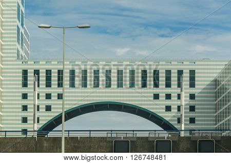Highway pass right underneath a building in Den Haag Scheveningen in the Netherlands.