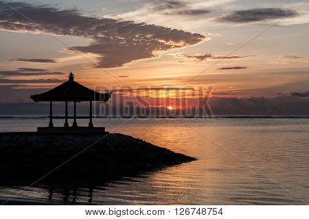 Sunrise on the Sanur beach, Bali, Indonesia.