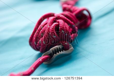 Rope on a camp tent closeup green
** Note: Shallow depth of field