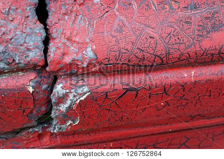 Cracked Red Paint On Grunge Metal Surface - Macro 2