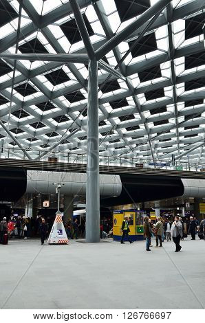 The Hague Netherlands - May 8 2015: Travelers at central Station of The Hague Netherlands on May 8 2015. The station is the largest railway station in The Hague.