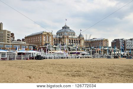 The Hague Netherlands - May 8 2015: Tourists at Kurhaus of Scheveningen or Grand Hotel Amrath Kurhaus The Hague. It is located in the main seaside resort area near the beach.