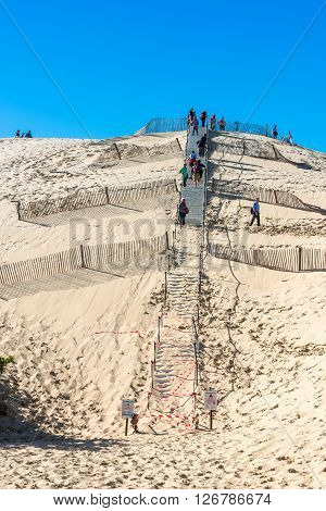 People Visiting The Highest Sand Dune Of Pyla In Europe