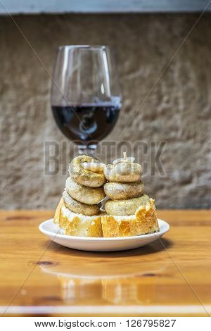 Typical spanish mushrooms pincho (Pintxo de champi