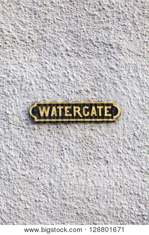 A street sign for Watergate in Edinburgh Scotland. The location gets its name from a medieval gateway that controlled traffic in and out of the area.