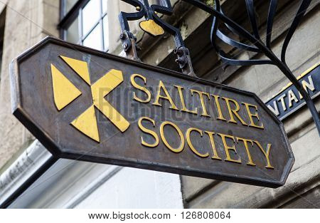EDINBURGH SCOTLAND - MARCH 12TH 2016: A sign for the historic Saltire Society in Edinburgh on 12th March 2016. The society was set up in 1936 to promote the understanding of the culture and heritage of Scotland.