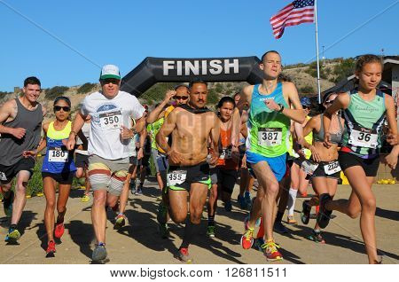 Crystal Cove California/USA-April 16 2016:Runners in the Heroes 6k Trail race