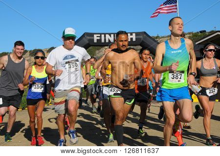 Crystal Cove California/USA-April 16 2016:Runners in the Heroes 6k Trail race