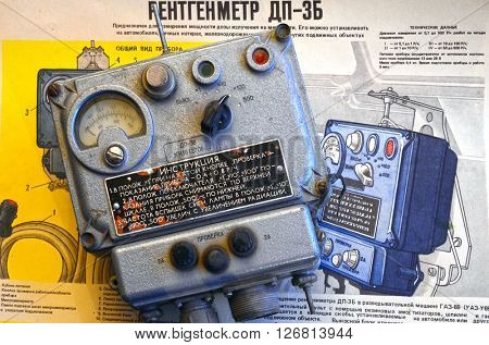 ILLUSTRATIVE EDITORIAL.Vintage Soviet military radiometer DP-3B.For tanks and another transport.Background - poster Soviet Civil Defense: DP-3B,design and usage.At April 19,2016 Kiev, Ukraine