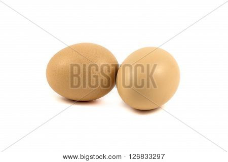 two chicken eggs isolated on white background