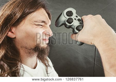 Unhappy Male Playing Games