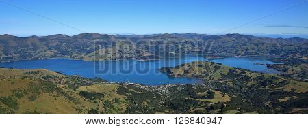 Beautiful landscape on the Banks Peninsula New Zealand. Distant view of Akaroa. Blue bay and green hills. Famous travel destination. Popular harbour for cruise ships.
** Note: Soft Focus at 100%, best at smaller sizes