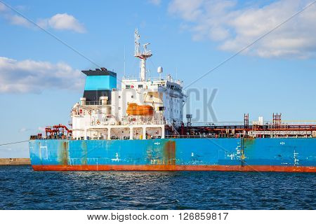 The quarterdeck of a cargo ship at sea.
