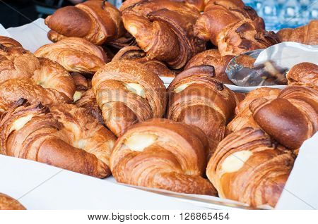 group of croissants with jam vanilla cream and honeyitaly