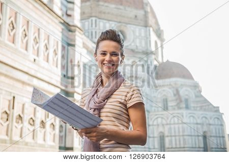 Happy Woman Tourist With Map Listening To Audio Guide, Florence