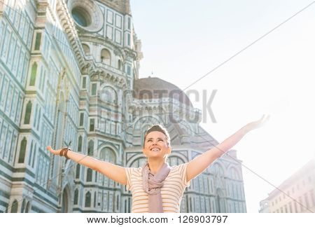 Happy Woman Tourist Rejoicing In The Front Of Duomo, Florence