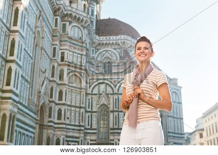 Woman Tourist Standing Near Duomo And Looking Into Distance