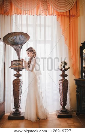 Beautiful bride in white dress on her wedding day