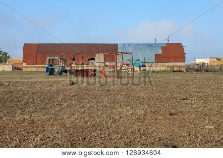 Abandoned farm equipment field barn. The landscape of the Russian village on the Volga river
** Note: Visible grain at 100%, best at smaller sizes