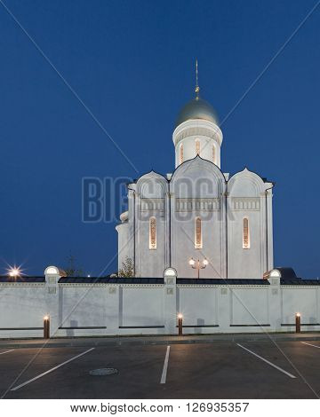 The temple and the fence and street lamps. Architectural lighting.