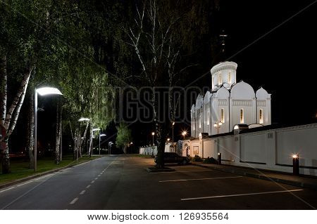 Parking next to orthodox temple complex. Architectural lighting.