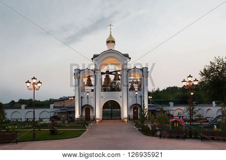 Orthodox temple complex. Architectural lighting. Street lamp and bell tower.