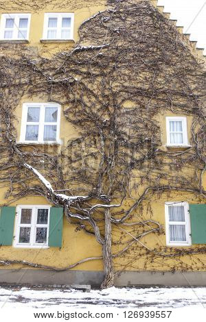 Augsburg Germany - January 17 2016:The Fuggerei is the world's oldest social housing complex still in use. It is a walled enclave within the city of Augsburg Bavaria.