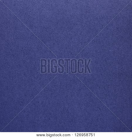 Royal blue suede leather texture. Close up top view.