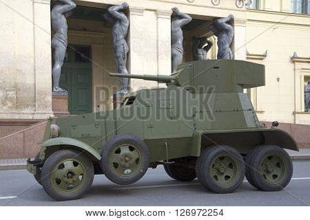 SAINT PETERSBURG, RUSSIA - MAY 05, 2015: Soviet armored car 30-ies BA-3 on the background of the New Hermitage