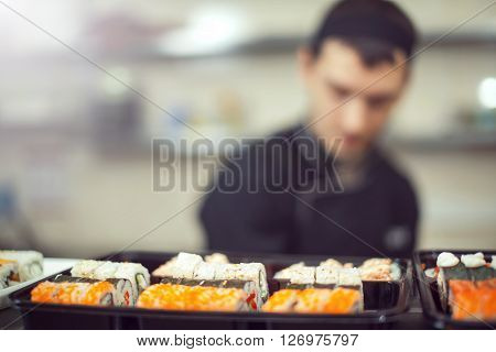 Cooks Preparing Sush