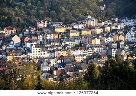 pattern of houses built mountainside where in Idar Oberstein Germany known as a gemstone town