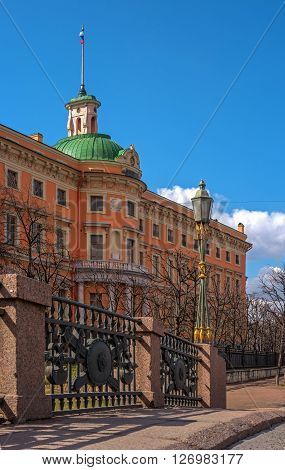 East facade of Mikhailovsky castle in St. Petersburg. In the foreground of the fence of the bridge over the moat defensive.