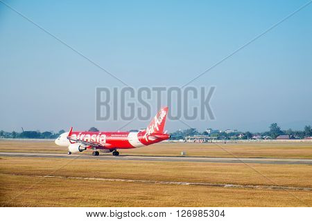 SATTAHIP, THAILAND - 21 DEC - Air Asia airline's passenger plane at U-Tapao airport with dried grass ground at Sattahip, Thailand on December 21, 2015