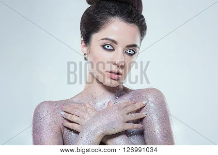 Potrtait of woman with beautiful creative fashion makeup