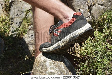 Walking Shoes. All Terrain Shoes. Hiking Shoes On Hiker Outdoors Walking Crossing River Creek. Woman