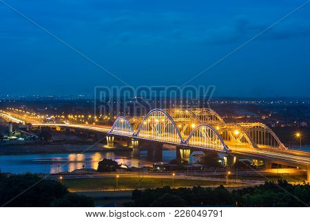 Aerial View Of Dong Tru Bridge Crossing Red River At Twilight In Hanoi, Vietnam