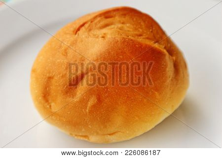 Fresh Fragrant Bread On The White Plate