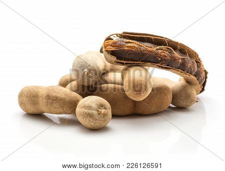 Tamarind In A Brittle Shell And One Open With Brown Jelly Flesh Isolated On White Background Indian 