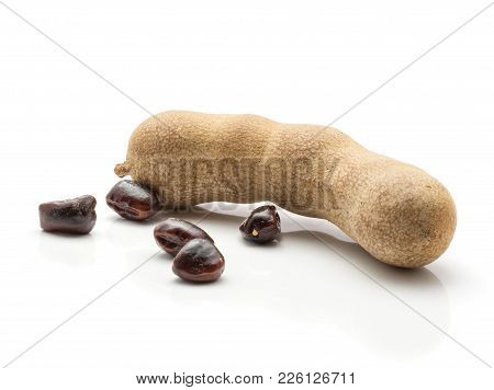 One Tamarind In A Brittle Shell With Five Flat Glossy Seeds Isolated On White Background Indian Date