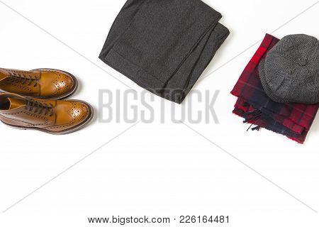 Fashion Concepts. Pair Of Luxury Tan Brogue Boots, Fashion Old School Hat Over Checkered Scarf And G
